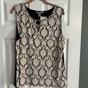 Chic Black and Cream Sleeveless Blouse